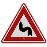Nabasco Sign verkeersbord RVV J05 s-bocht(en) eerst naar links - levensduur 20 jaar - afmeting 700mm driehoek